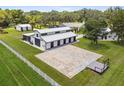 Aerial view of a spacious barn and surrounding property at 4600 Nebraska Ave, Sanford, FL 32771