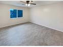 Spacious bedroom with ceiling fan and neutral walls at 4934 Samoa Cir # 7, Orlando, FL 32808
