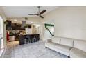 Open concept kitchen and living area with modern kitchen at 501 N Normandale Ave, Orlando, FL 32835