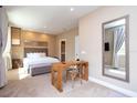 Bright bedroom with a comfortable bed and a built-in workspace at 7487 Brooklyn Dr, Kissimmee, FL 34747