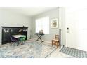 Cozy play room features a table, chairs, keyboard, and bookshelves at 1186 August Sky Dr, Deltona, FL 32738