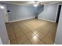 Spacious living room with tile floors and neutral-toned walls at 1123 Spring Meadow Dr # 1123, Kissimmee, FL 34741