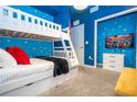 Toy Story themed bedroom with bunk beds and TV at 3191 Paradox Cir # 102, Kissimmee, FL 34746