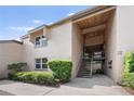 Building entrance with stairs and landscaping at 538 Windmeadows St, Altamonte Springs, FL 32701