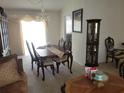 Bright dining room featuring a wood table and chairs at 713 W 2Nd St, Lakeland, FL 33805