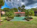 Inviting community with putting green and landscaping at 1181 Paseo Del Mar # D, Casselberry, FL 32707