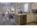 Modern kitchen with stainless steel appliances and an island at 1002 Calabria Ave, Davenport, FL 33897