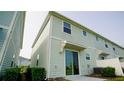 Private patio and sliding glass doors leading to a fenced backyard at 4832 Tribute Trl, Kissimmee, FL 34746