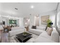 Open concept living and dining area with modern decor at 42 W Harding St # B, Orlando, FL 32806