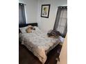 Cozy bedroom with double bed and decorative pillows at 2012 Vincent Rd, Orlando, FL 32817