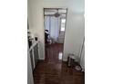 Kitchen with dark laminate flooring, and access to laundry area at 2012 Vincent Rd, Orlando, FL 32817