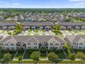 Aerial view of townhomes and neighborhood at 1625 Reflection Cv, Saint Cloud, FL 34771