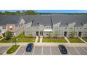 Townhouses with parking and landscaping at 1676 Tropical Palms Cir, Kissimmee, FL 34747