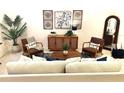 Bright living room with comfy seating and stylish decor at 1436 Silver Lining Way, Apopka, FL 32703