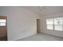Spacious bedroom with high ceilings and carpet at 11188 Hess Way, Oxford, FL 34484
