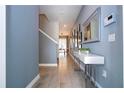 Open entryway with tile floors and a view to the living area at 4837 Dedication St, Kissimmee, FL 34746