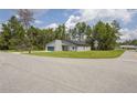 New home on a corner lot with grassy yard and a quiet street at 5277 Sw 165Th Street Rd, Ocala, FL 34473