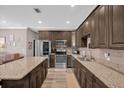 Modern kitchen with stainless steel appliances and ample counter space at 237 Lake View Dr, Sanford, FL 32773