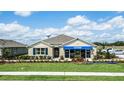 One-story home with landscaping and a welcoming front porch at 3907 Botancial Court, Sanford, FL 32773