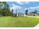 One story home with a spacious yard at 781 Marion Oaks Trl, Ocala, FL 34473