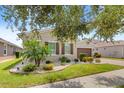 Two-story home with landscaping and curb appeal at 290 Silver Maple Rd, Groveland, FL 34736