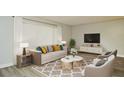 Living Room with contemporary decor and neutral tones at 213 E Hillcrest St, Altamonte Springs, FL 32701