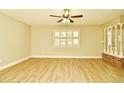 Living room with light floors and ceiling fan at 1781 Carlton St, Longwood, FL 32750