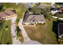 House with a large yard, viewed from above at 13707 Calle De Ora Ct, Clermont, FL 34711