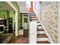 Elegant staircase with ornate detailing at 2301 Ne 97Th Street Rd, Anthony, FL 32617