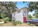 Detached garage with upper-level storage area at 2301 Ne 97Th Street Rd, Anthony, FL 32617