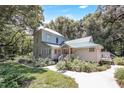 House exterior showcasing side view and deck at 2301 Ne 97Th Street Rd, Anthony, FL 32617