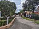 Gated entrance to Oak Shadow Condominium community at 2860 N Powers Dr # 133, Orlando, FL 32818