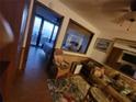 Living room with ocean view, comfortable seating, and access to the bedroom at 2301 S Atlantic Ave # 327, Daytona Beach, FL 32118