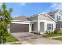 One-story home with a two-car garage and curb appeal at 4939 Worchester Dr, Kissimmee, FL 34746