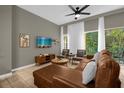Spacious living area with comfortable sectional sofa and large TV at 1121 Park Ridge Cir, Kissimmee, FL 34746