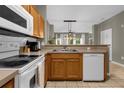 Well-equipped kitchen with ample cabinetry and counter space at 1121 Park Ridge Cir, Kissimmee, FL 34746