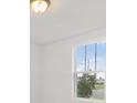 Bright bedroom with a window offering natural light at 2482 Leeds St, Haines City, FL 33844