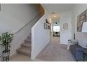 Bright and spacious entryway with stairs leading upstairs at 190 Mandovi St, Davenport, FL 33837