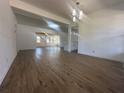 Bright and airy living room with hardwood floors and lots of natural light at 111 Lake Dot Dr, Sanford, FL 32773