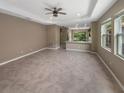 Open living room and kitchen area with tile flooring at 3402 Sagebrush St, Harmony, FL 34773