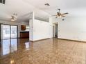 Bright living room with tile flooring and ceiling fans at 855 San Pedro Ct, Kissimmee, FL 34758