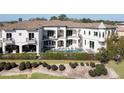 Luxury home with pool and landscaped backyard at 925 Desert Mountain Ct, Reunion, FL 34747