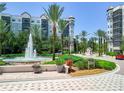 Community entrance with fountain and landscaping at 14501 Grove Resort Ave # 3132, Winter Garden, FL 34787