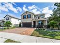 Two-story house with a two-car garage at 5200 Landmark Dr, St Cloud, FL 34771