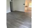 Spacious living room featuring wood-look floors at 830 Wooden Blvd, Orlando, FL 32805