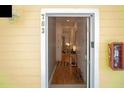 Bright condo entryway with wood floors and access to living spaces at 703 Lucaya Loop # 1103, Davenport, FL 33897