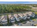 Aerial view of a row of two-story houses at 4424 Kaipo Rd, Davenport, FL 33897