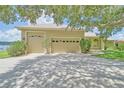 Two-car garage with attached carport at 11062 Crescent Bay Blvd, Clermont, FL 34711