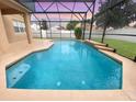 Inviting screened-in pool area with a relaxing atmosphere at 11932 Old Glory Dr, Orlando, FL 32837