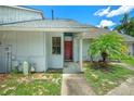 Condo exterior view with walkway and landscaping at 101 N Hill Ave # 4, Deland, FL 32724